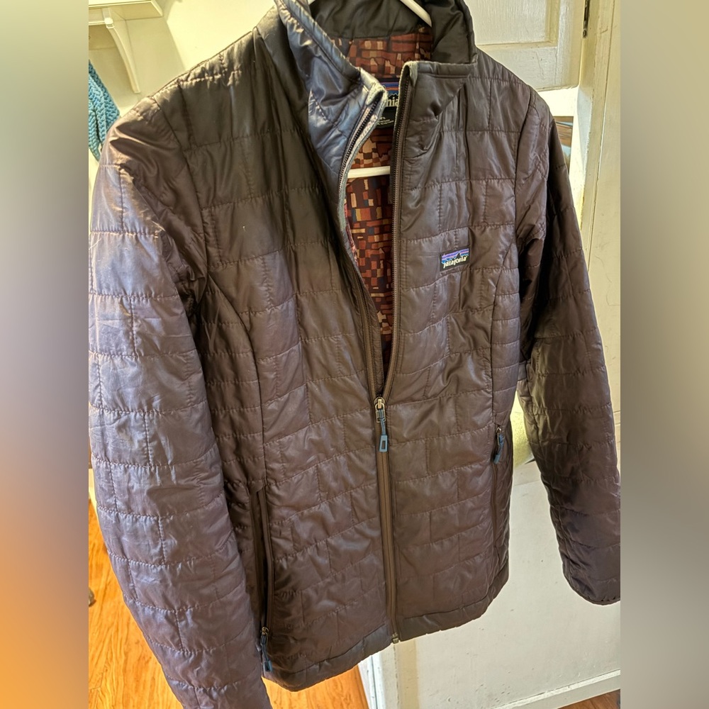 Women's dark purple Patagonia jacket. New without tags.